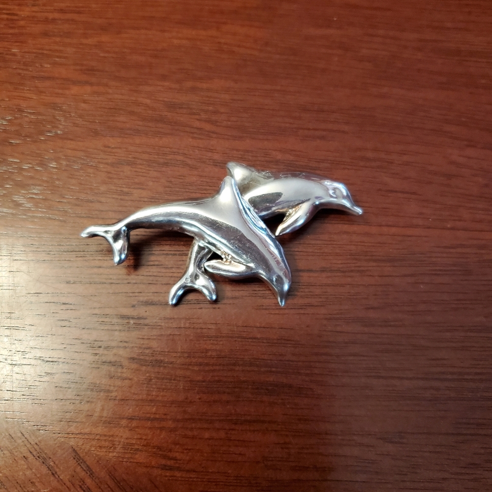 Dolphin brooch